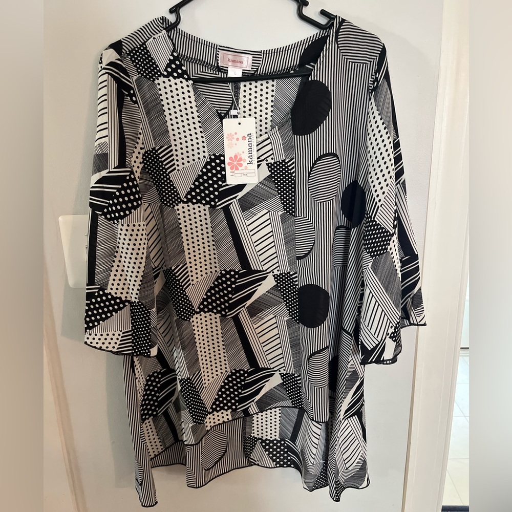 Woman’s sheer, new with tags, top